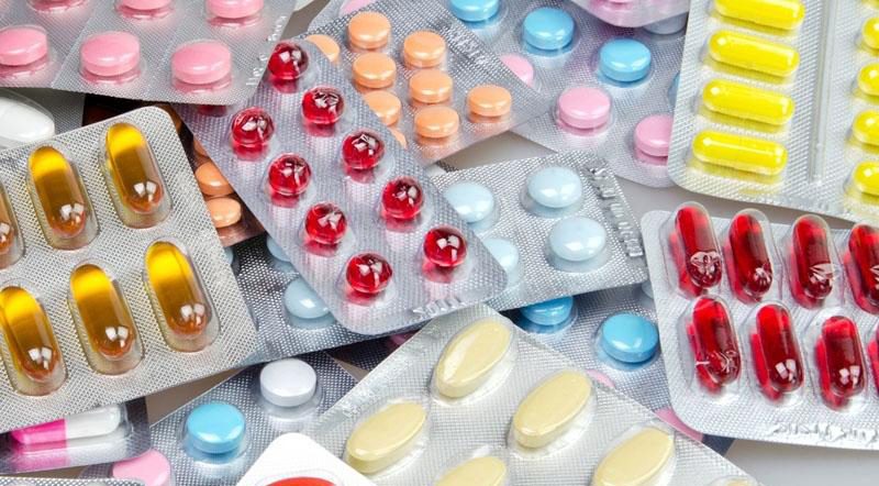 Various Colorful Pills in Packages - Close Up